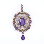 An early 20th century 9ct gold amethyst and split pearl openwork pendant, height excluding bale 37.