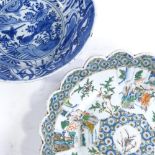 A Chinese porcelain bowl with painted figures and scalloped edge, diameter 24cm, and a blue and