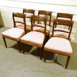 A set of 6 George III mahogany dining chairs, with rope twist back rails, recently re-upholstered