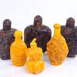 A group of Chinese relief carved amber snuff bottles, largest height 8cm (6)