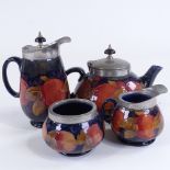 MOORCROFT POTTERY - pomegranate pattern 4-piece tea set with hammered pewter mounts Tea pot spout