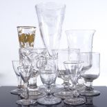 A group of mainly 19th century glassware, including a large funnel shaped goblet with wheel-cut wild