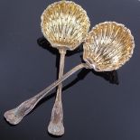 A pair of 19th century Swedish silver sugar sifter spoons, Queen's pattern handles with gilt shell