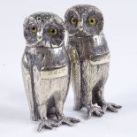 A pair of Victorian electroplate owl design salt and pepper pots, height 7.5cm