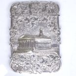 A Victorian silver castle-top card case, the Royal Exchange, with high relief main scene within a