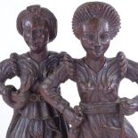 A pair of 18th century carved oak Classical figures, height 50cm