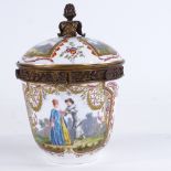 A late 19th century German porcelain urn and cover, with painted and gilded decoration, and gilt-
