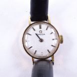 OMEGA - a lady's Vintage 9ct gold mechanical wristwatch, silvered dial with gilt baton hour markers,