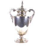 A large and impressive George V solid silver 2-handled trophy, with scrolled riveted style