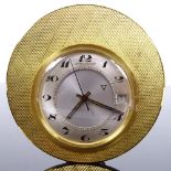 JAEGER LECOULTRE - a Vintage gold plated travelling alarm clock timepiece, silvered dial with