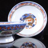 A pair of Chinese white glaze porcelain footed bowls, with painted and gilded decoration,