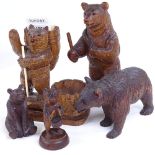 A group of 19th century Black Forest carved wood bears, tallest 16cm (5)