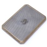 An Art Deco Asprey's silver and gilt cigarette case, canted rectangular form with engine-turned