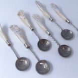 A set of 6 mid-century East African silver coin souvenir spoons, camel teeth handles with one