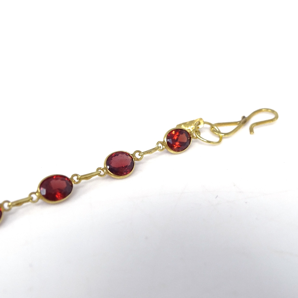 An unmarked gold oval-cut rose garnet line necklace, necklace length 52cm, 7.7g Very good original - Image 3 of 7