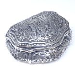 A 19th century German Hanau silver snuff box, shaped cartouche form with relief embossed classical