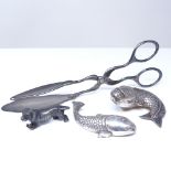 A pair of Thorvald Mathinsen Norwegian cake tongs, Tostrup novelty fish pepperette, sterling fish