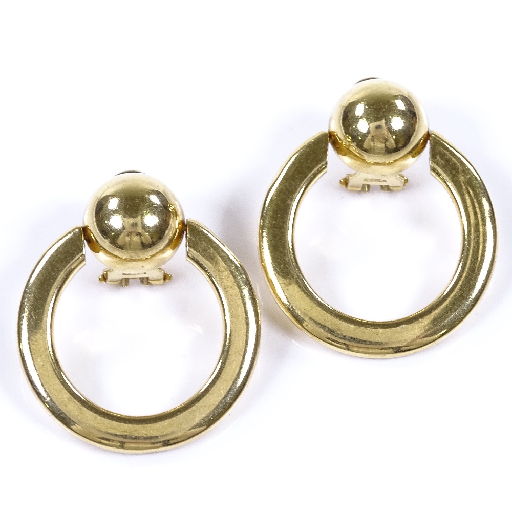 A pair of 18ct gold swivel hoop earrings, earring height 32.3mm, 11.2g Very good overall