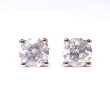A pair of 14ct rose gold 1.8ct solitaire diamond earrings, with stud fittings, each diamond approx