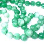 A long polished green quartz bead necklace, bead diameter approx 16mm, necklace length 120cm, Good