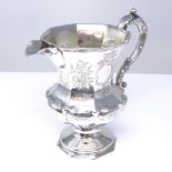 * WITHDRAWN* A Victorian silver thistle shaped pedestal cream jug, floral engraved bright-cut