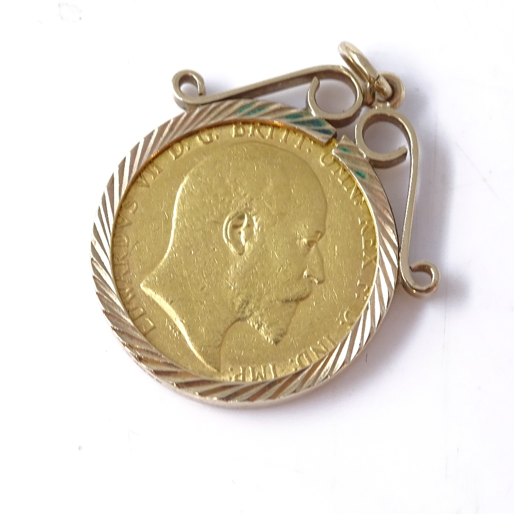 An Edward VII 1904 gold sovereign, in 9ct pendant mount, 10.8g gross Good condition, general surface - Image 2 of 4