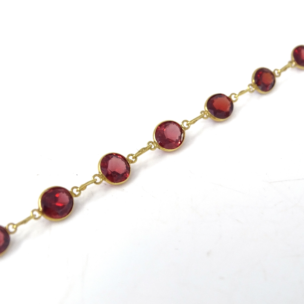 An unmarked gold oval-cut rose garnet line necklace, necklace length 52cm, 7.7g Very good original - Image 5 of 7