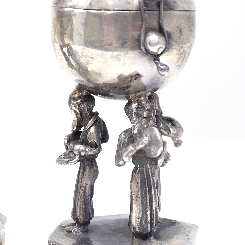 A pair of Russian silver Judaica besamim spice boxes, stone-set lids supported by rabbi figures, - Image 2 of 6