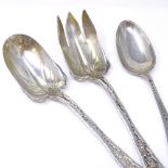 TIFFANY & CO - a pair of 19th century American sterling silver salad servers, relief floral