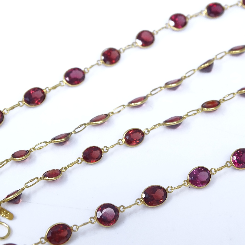 An unmarked gold oval-cut rose garnet line necklace, necklace length 52cm, 7.7g Very good original - Image 6 of 7