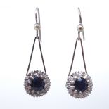 A pair of unmarked white gold sapphire and diamond cluster pendant earrings, set with round sapphire