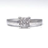 A platinum Princess-cut diamond cluster ring, total diamond content approx 0.25ct, setting height