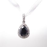 A 14ct white gold black and colourless diamond cluster pendant, pear-cut black diamond approx 3.