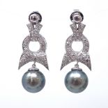 A pair of Art Deco style 14ct white gold cultured Tahitian pearl and diamond bow earrings, with