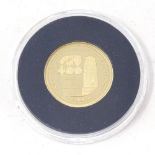 A Centenary of World War I 22ct gold proof £1 coin by The Jubliee Mint, reverse depicting War
