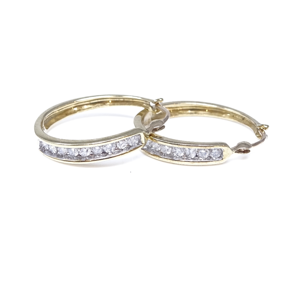 A pair of 9ct gold 0.5ct diamond hoop earrings, each earring diamond content approx 0.25ct, - Image 4 of 4