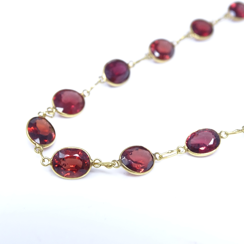 An unmarked gold oval-cut rose garnet line necklace, necklace length 52cm, 7.7g Very good original - Image 4 of 7