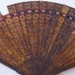 A 19th century Chinese tortoiseshell brise fan, carved and pierced guards with main temple decorated