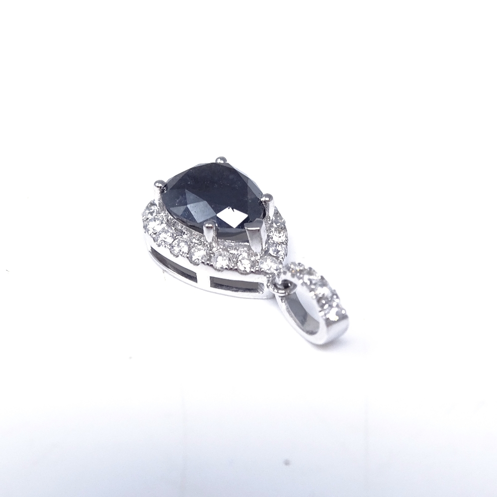 A 14ct white gold black and colourless diamond cluster pendant, pear-cut black diamond approx 3. - Image 2 of 4
