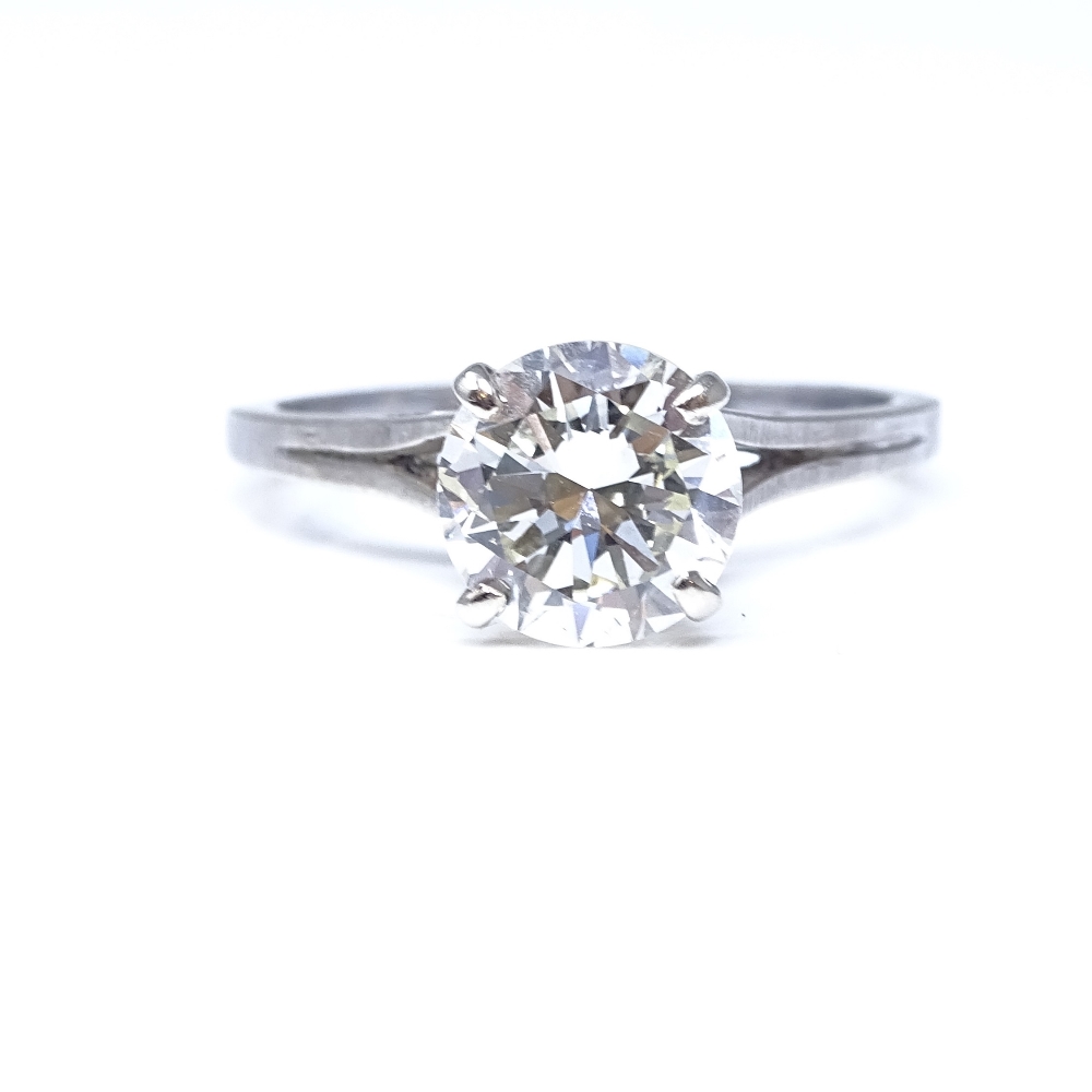 A 14ct white gold 1.6ct solitaire diamond ring, high 4-claw setting, diamond weighs approx 1.6ct,