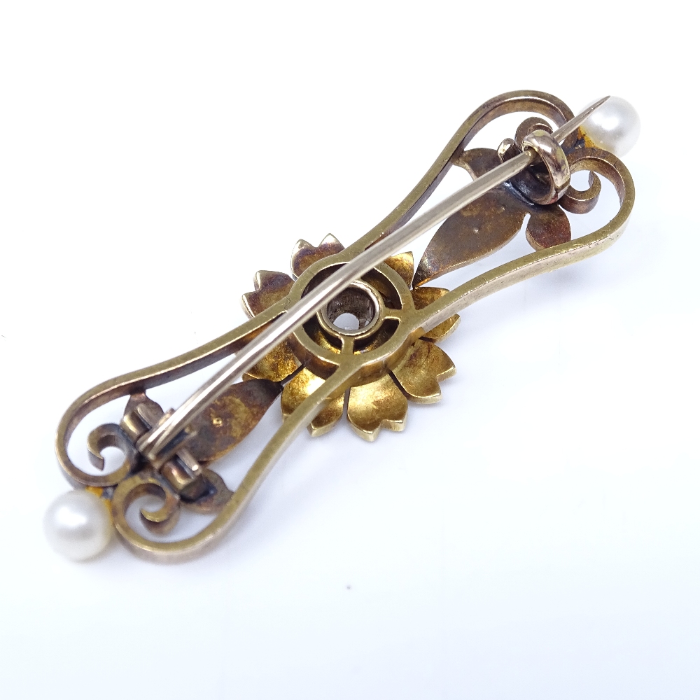 A Victorian unmarked gold pearl and diamond floral brooch, set with whole pearls, split pearls and - Image 3 of 4