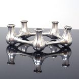 E DRAGSTED - a mid-century Danish silver plated stylised modernist 5-section table centre taper