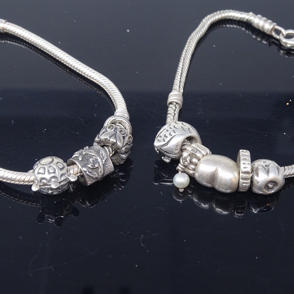 10 Pandora silver charms and spacers, on 2 unnamed sterling silver charm bracelets, bracelet lengths