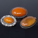 2 Vintage Danish silver-mounted amber brooches and a pendant, largest length 48.6mm, 44.5g total, (