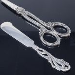 A pair of Art Nouveau Danish silver scissors, and a Danish silver stylised butter knife, scissor