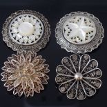 2 stylised silver and mother-of-pearl brooches, and 2 similar silver filigree brooches, largest