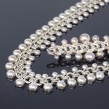 HERMANN SIERSBOL - a Vintage Danish silver matching necklace and brooch set, double-link chain