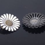 ANTON MICHELSEN - a Danish vermeil sterling silver and white enamel Daisy pattern brooch, and a