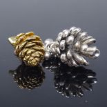 A Danish vermeil sterling silver pine cone pendant, and a similar unmarked silver articulated