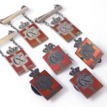 GEORG JENSEN - a set of 7 Danish sterling silver and red enamel Kingmark badges and brooches,